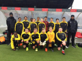 Under 14s in Sutton Utd's dugout
